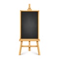 Realistic black chalkboard on wooden easel. Blank blackboard in wooden frame on a tripod. Presentation board, writing