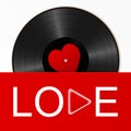 Realistic Black Vinyl Record with red heart label in a bright cover with word love and play button. Retro Sound Carrier on white Royalty Free Stock Photo