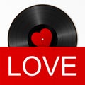 Realistic Black Vinyl Record with red heart label in a bright cover with word love. Retro Sound Carrier on white background Royalty Free Stock Photo