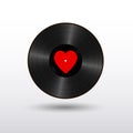 Realistic Black Vinyl Record with red heart label. Retro Sound Carrier isolated on white background Royalty Free Stock Photo