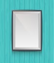 Realistic blank poster in a wooden picture frame