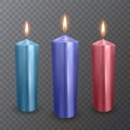 Realistic candles of blue, purple and red colors, Burning candles on dark background, paraffin or wax on transparent background. Royalty Free Stock Photo