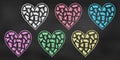 Realistic Chalk Drawn Sketch. Set of Design Elements Colorful Hearts Isolated on Chalkboard Backdrop Royalty Free Stock Photo