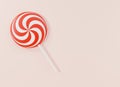 Realistic Christmas round candy striped on pink pastel background Royalty Free Stock Photo