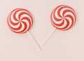 Realistic Christmas round candy striped on pink pastel background Royalty Free Stock Photo