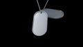 Realistic close up of military dog tags isolated black background Royalty Free Stock Photo