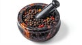 Realistic clove and black peppercorns in marble mortar for culinary use Royalty Free Stock Photo