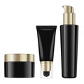 Realistic cosmetic black bottles with gold caps. Vector containers and tubes for cream, balsam, lotion, gel, foundation