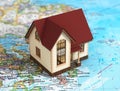 Realistic cottage in world map. Royalty Free Stock Photo