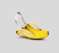 Realistic 3d illustration of glass banana on gray background