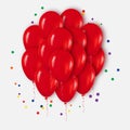 Realistic 3d Red Bunch of Balloons Flying for Party and Celebrations with confetti. Royalty Free Stock Photo