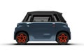 Realistic 3D render of a bluish-gray colored small electric car, full left side view, white background Royalty Free Stock Photo