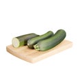 Realistic 3D render of three zucchinis on a wooden board Royalty Free Stock Photo