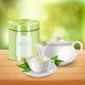 Realistic Detailed 3d Tea Metal Tin, Teapot and Cup on Wooden Surface and Blurred Background. Vector Royalty Free Stock Photo