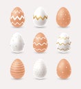 Realistic Easter Eggs set with modern white and golden ornament on brown and white chicken eggs. - Vector illustration Royalty Free Stock Photo