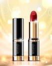 Realistic fashion cosmetic golden lipstick advertising poster on shining background.
