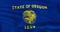 Realistic flag of State of Oregon on the wavy surface of silk. 3d illustration. Perfect for background or texture purposes