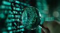 Realistic frosted glass magnifier reveals coding pattern in green and turquoise on dark background