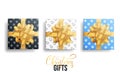 Realistic gifts. Christmas gift packages with gold bows and winter patterns Royalty Free Stock Photo