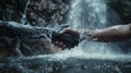 A realistic graph of two hands made of water splashes coming together in a handshake, with the Royalty Free Stock Photo