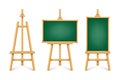 Realistic green chalkboard on wooden easel. Blank blackboard in wooden frame on a tripod. Presentation board, writing