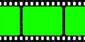 Realistic grunge film strip, camera roll. Old retro cinema movie strip with blank green chroma key background. Analog Royalty Free Stock Photo