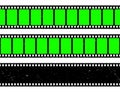 Realistic grunge film strip, camera roll. Old retro cinema movie strip with blank green chroma key background. Analog Royalty Free Stock Photo