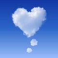 Realistic Heart shaped cloud in the blue sky. Royalty Free Stock Photo