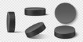 Realistic ice hockey puck. Black rubber puck in different positions, sport inventory for winter team game on skating rink, 3d Royalty Free Stock Photo