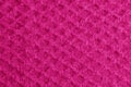 Realistic illustration of a lilac-pink knitted carpet close-up. Textile texture on a lilac-pink background. Detailed warm yarn Royalty Free Stock Photo