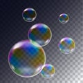 Realistic illustration of set of flying rainbow soap bubbles on transparent background, vector