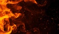 Realistic isolated fire effect for decoration and covering on black background. Concept of particles ,flame and light Royalty Free Stock Photo