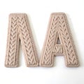 Realistic knitted letters \'MA\' isolated on white background Royalty Free Stock Photo