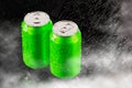 Realistic mock up aluminum green can,with clod and droplet condensation,on black background,with beverage,water,energy drink,beer, Royalty Free Stock Photo