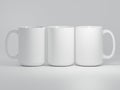 Three 15 oz Ceramic Mugs on a Plain White Background. Mock up for Drink Concept. Royalty Free Stock Photo