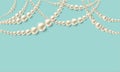 Realistic pearl necklaces over turquoise background. Vector