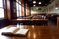 Realistic photo of book on wood desk in a library study room with cozy atmosphere