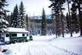 Realistic photo landscape of winter snow forest and camper