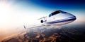 Realistic photo of white generic design private Jet flying over the mountains. Empty blue sky with sun at background Royalty Free Stock Photo