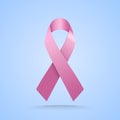 Realistic pink ribbon. Breast cancer awareness symbol on blue background.