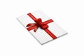 Realistic plain gift card template decorated with a red ribbon with a bow on white background.