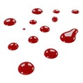 Realistic red liquid droplets scattered on a white background Royalty Free Stock Photo