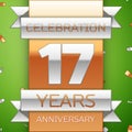 Realistic Seventeen Years Anniversary Celebration Design. Silver and golden ribbon, confetti on green background