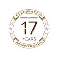 Realistic seventeen years anniversary celebration logo with ring and ribbon on white background. Vector template for