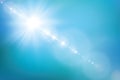 Realistic shining sun with lens flare. Blue sky with clouds background. Vector illustration. Royalty Free Stock Photo