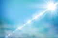 Realistic shining sun with lens flare. Blue sky with clouds background. Vector illustration. Royalty Free Stock Photo