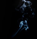 Realistic shot of a wisp of smoke against a black background - great for a cool background Royalty Free Stock Photo