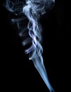 Realistic shot of a wisp of smoke against a black background - great for a cool background Royalty Free Stock Photo