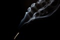 Realistic shot of a wisp of smoke against a black background - great for a cool background Royalty Free Stock Photo