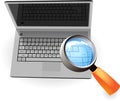 Realistic silver laptop and magnifying glass